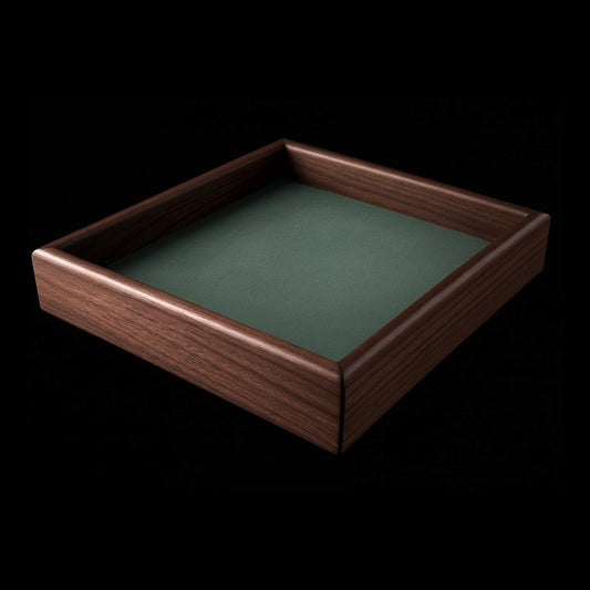 walnut wood tray with a green interior on a black background